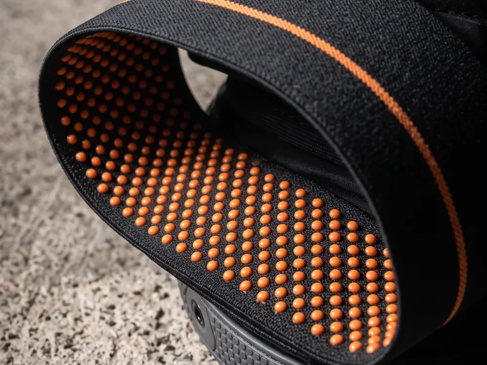The silicone grip dots on the inside of the knee pad band